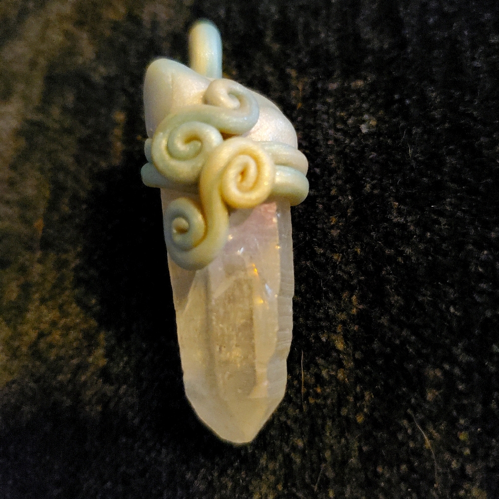 Aura quartz pendant.